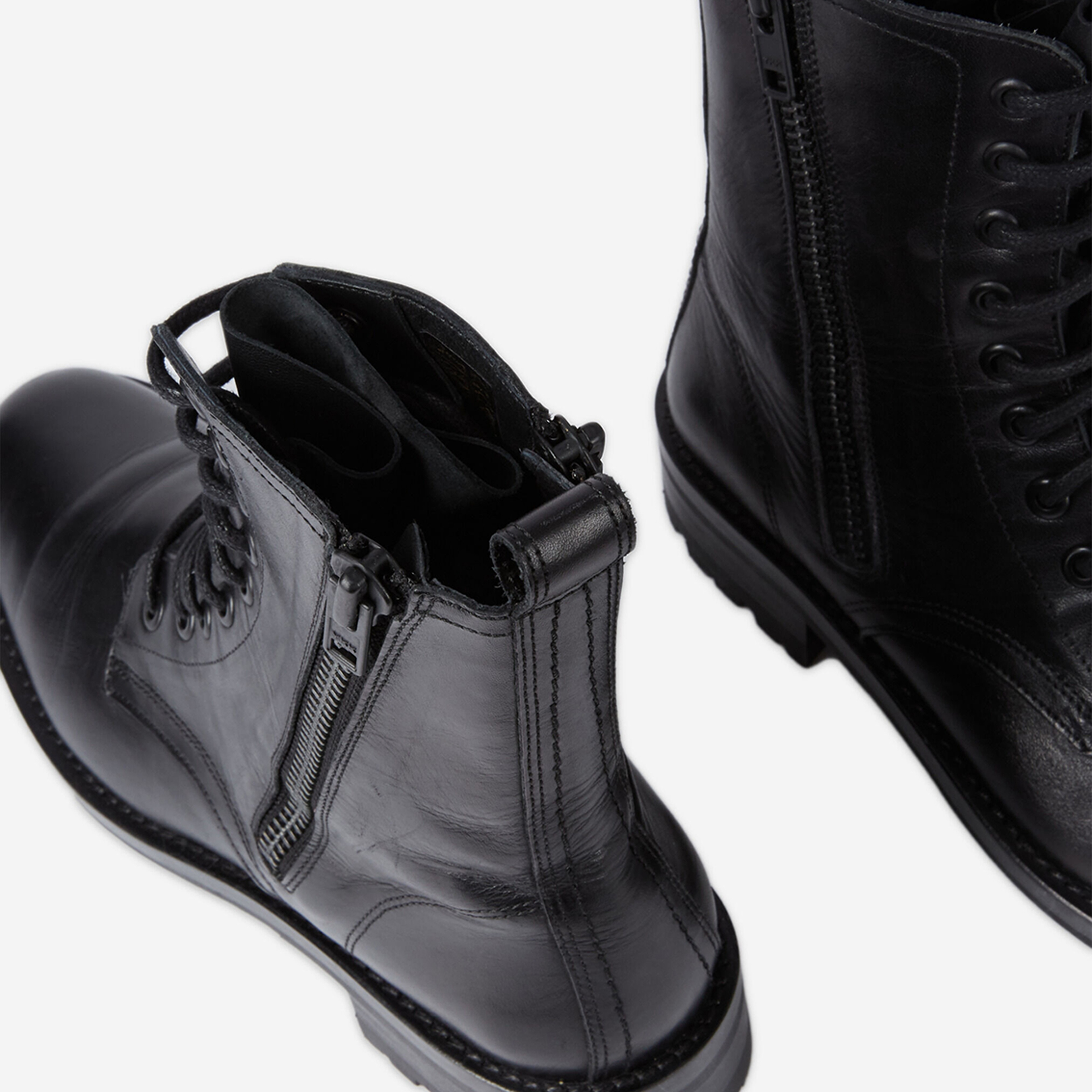 KADIN SİYAH DERİ BOT