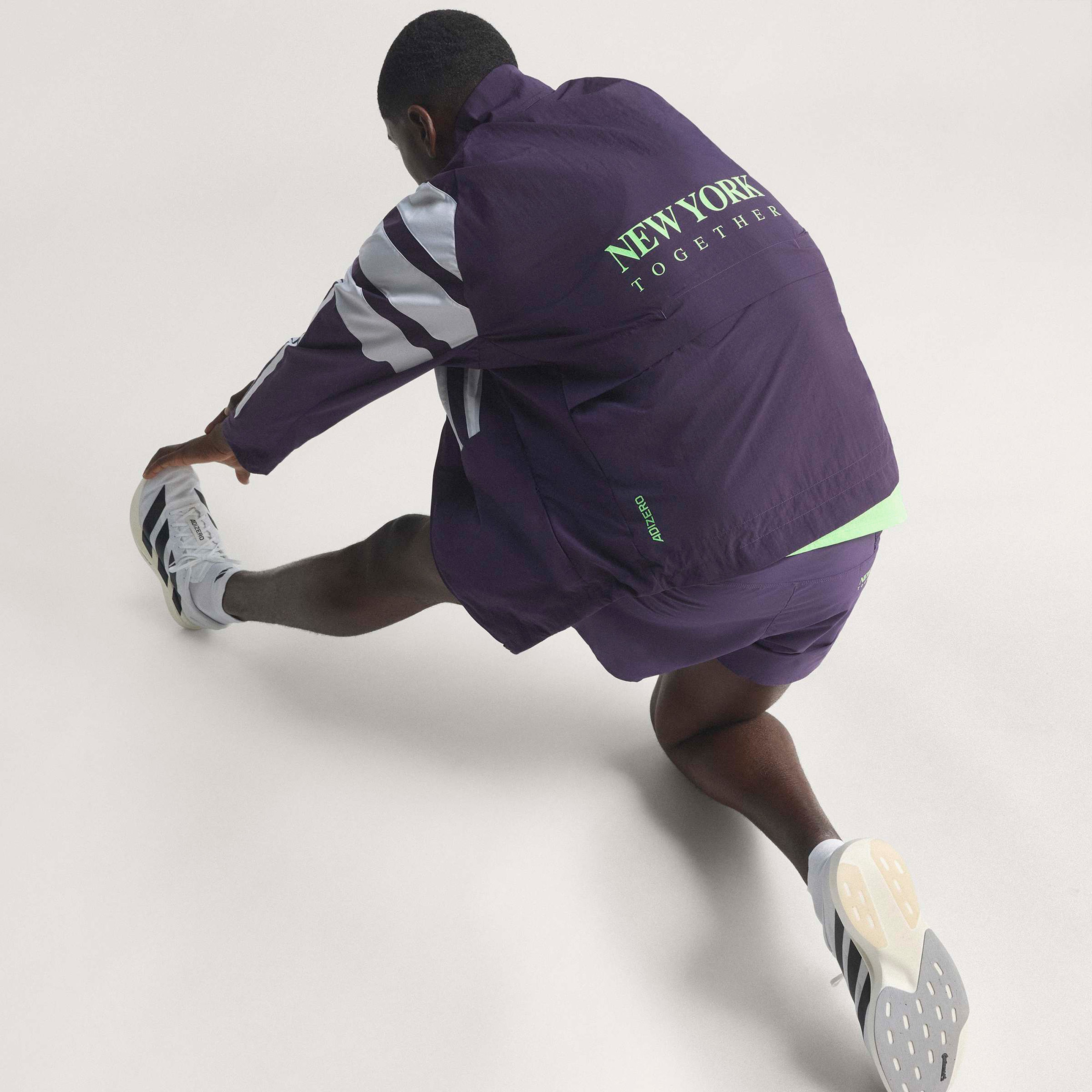 adidas Adizero Nyc Erkek Mor Koşu Rüzgarlığı