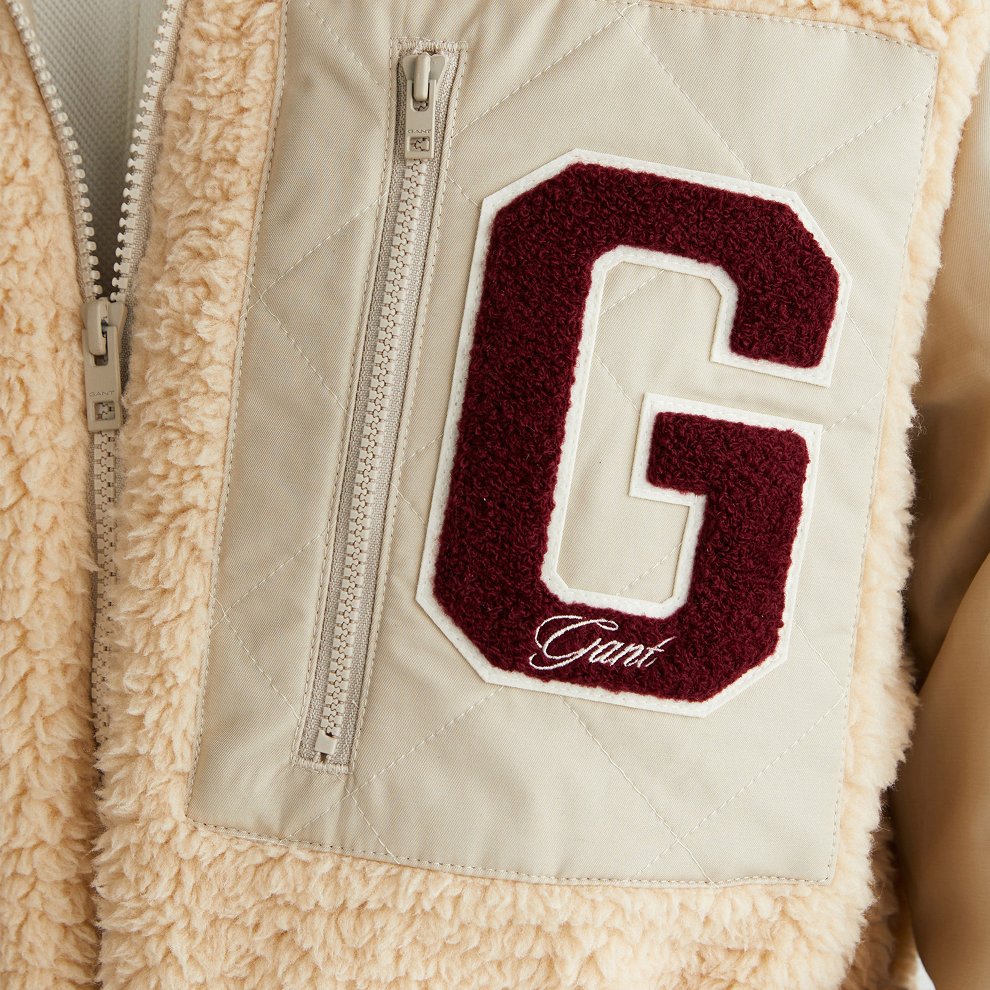 Logo-patched quilted jacket