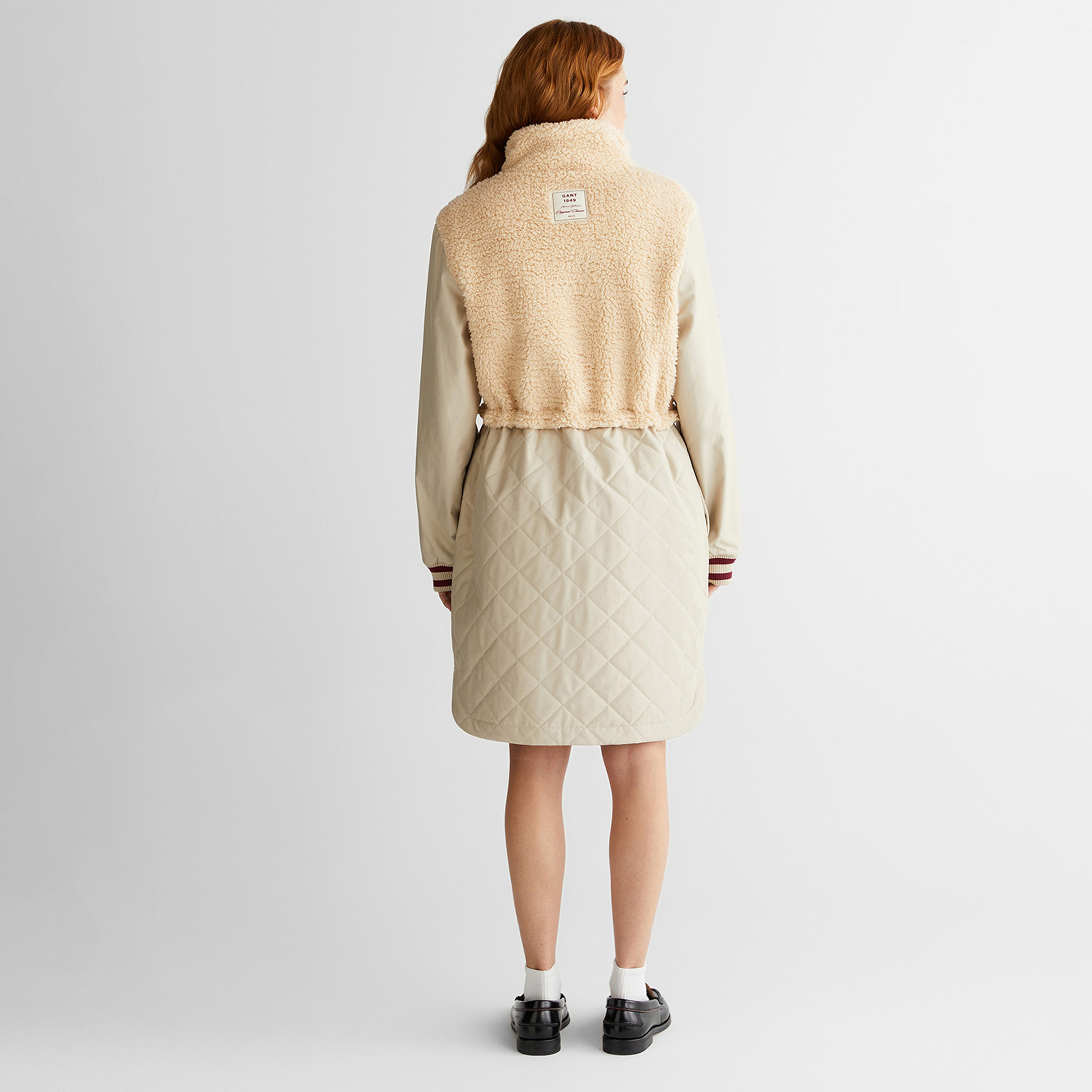 Logo-patched quilted jacket